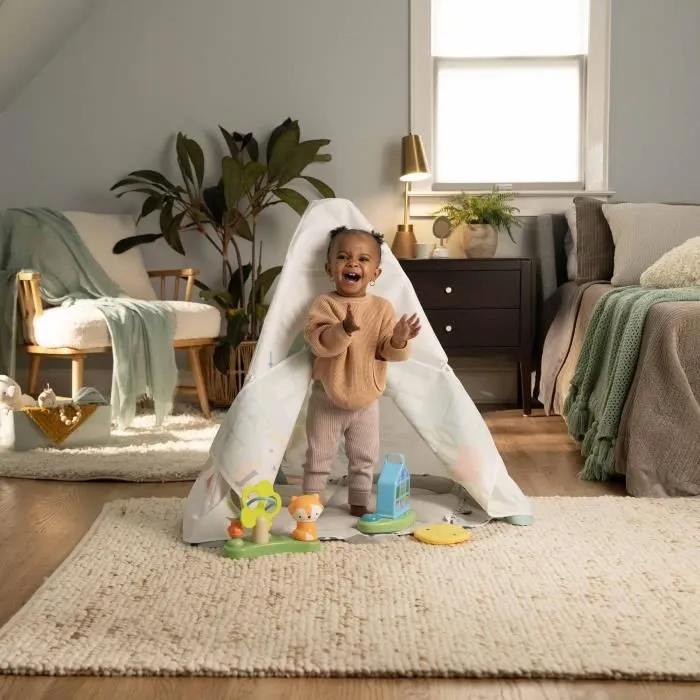 INGENUITY Aide jeux à rebonds bébé 6-en-1 évolutif : se tranforme en Tapis d'éveil, Tipi enfant, table d'activités, jouets amovibles-6