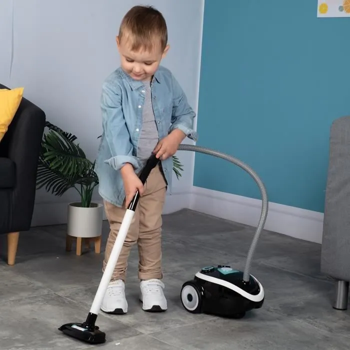 SMOBY Aspirateur compact et peu encombrant avec un véritable bruit d'aspirateur. 3 piles LR44 incluses - dès 3 ans-3