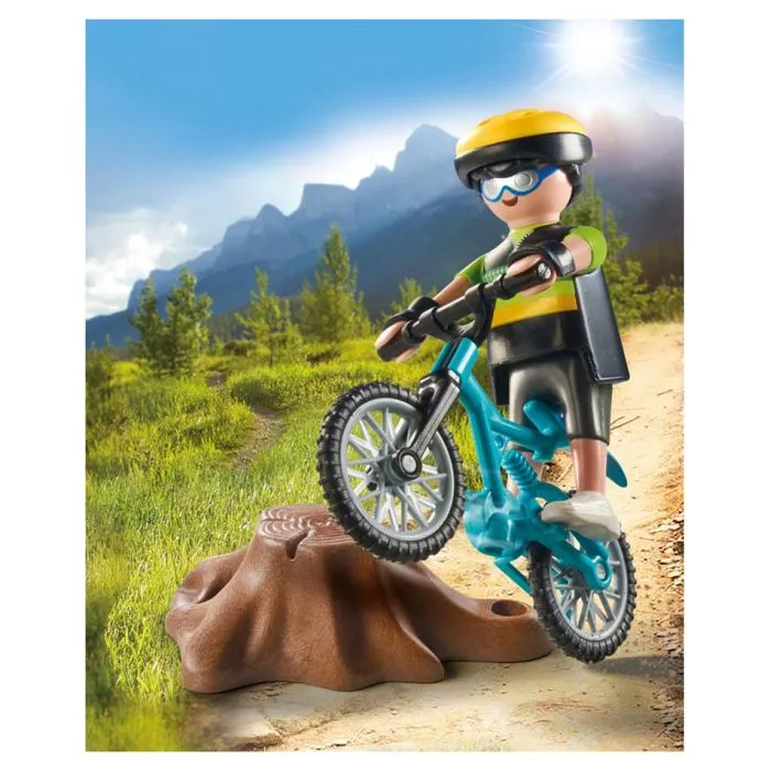 Cycliste avec vélo tout terrain et souche d'arbre-3