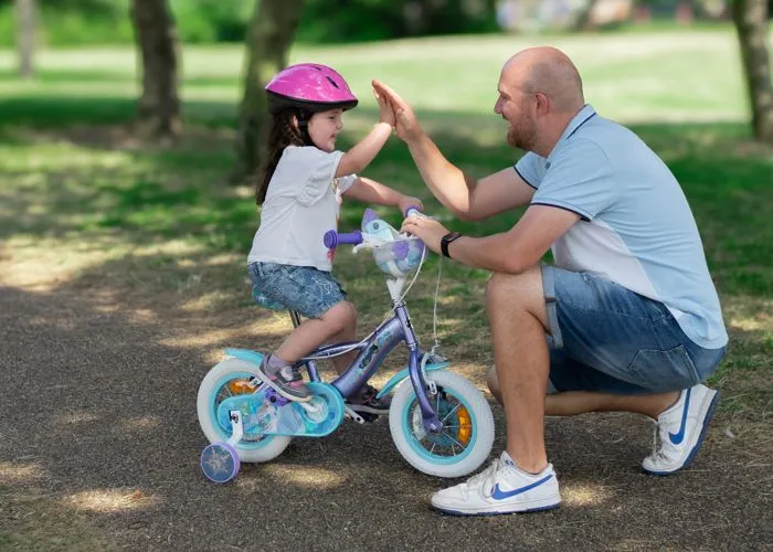 Vélo Enfant Disney - Reine Des Neiges - Roues 12" - Age 3-5 ans - 2 Freins - Stabilisateurs - Garde-Boue - Bleu - Produit HUFFY-2